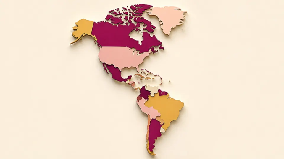 Paper-cut map of two linked continents made from countries in plum, gold and pink